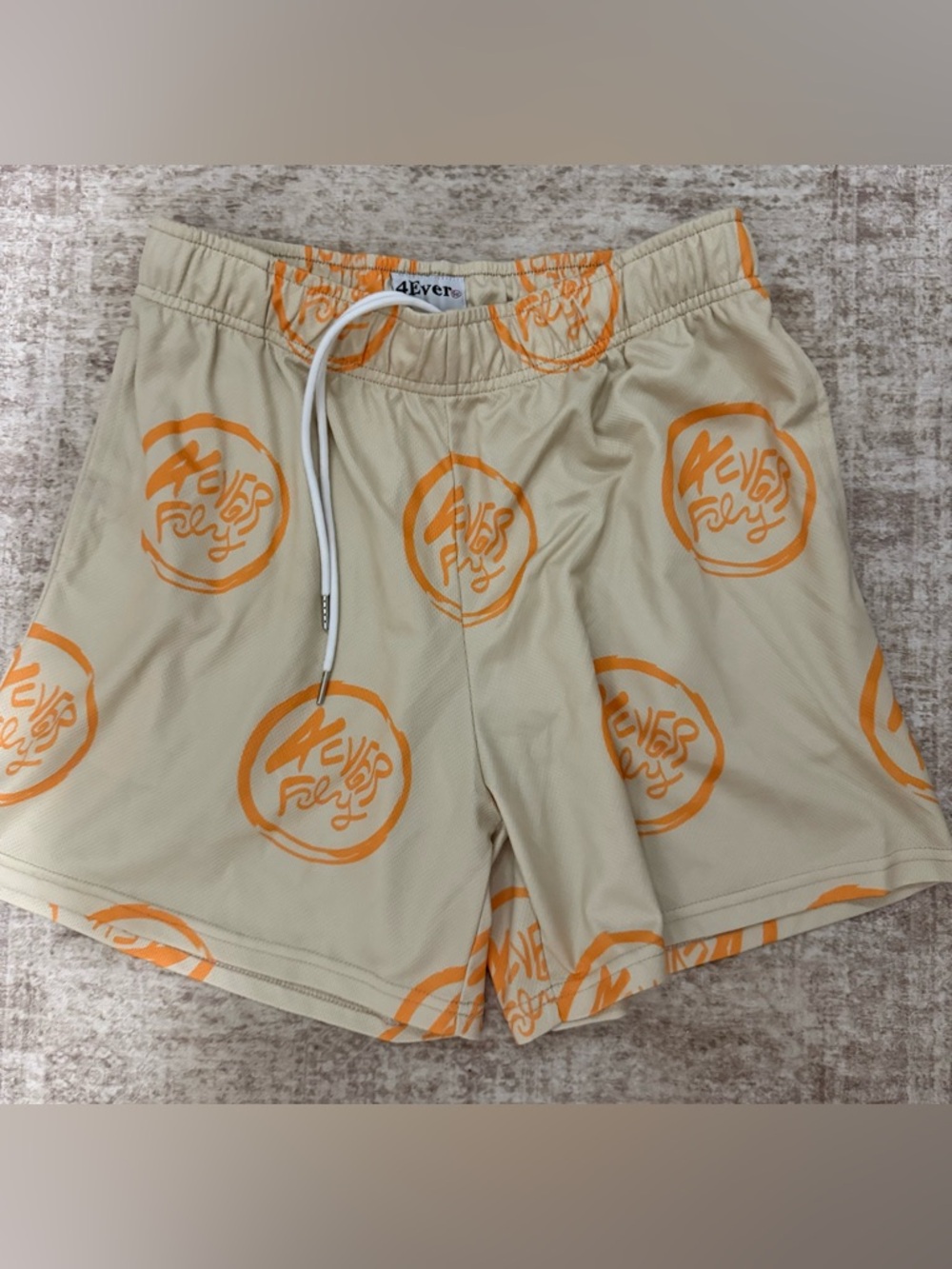 4Evers Beige Athletic Shorts with Orange Logo Print